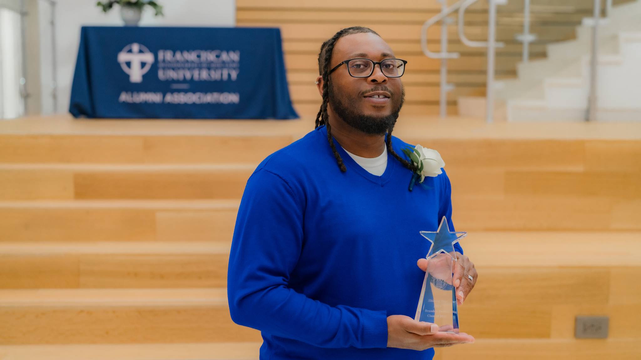 Brandon DeVold Holding Shining Star Award