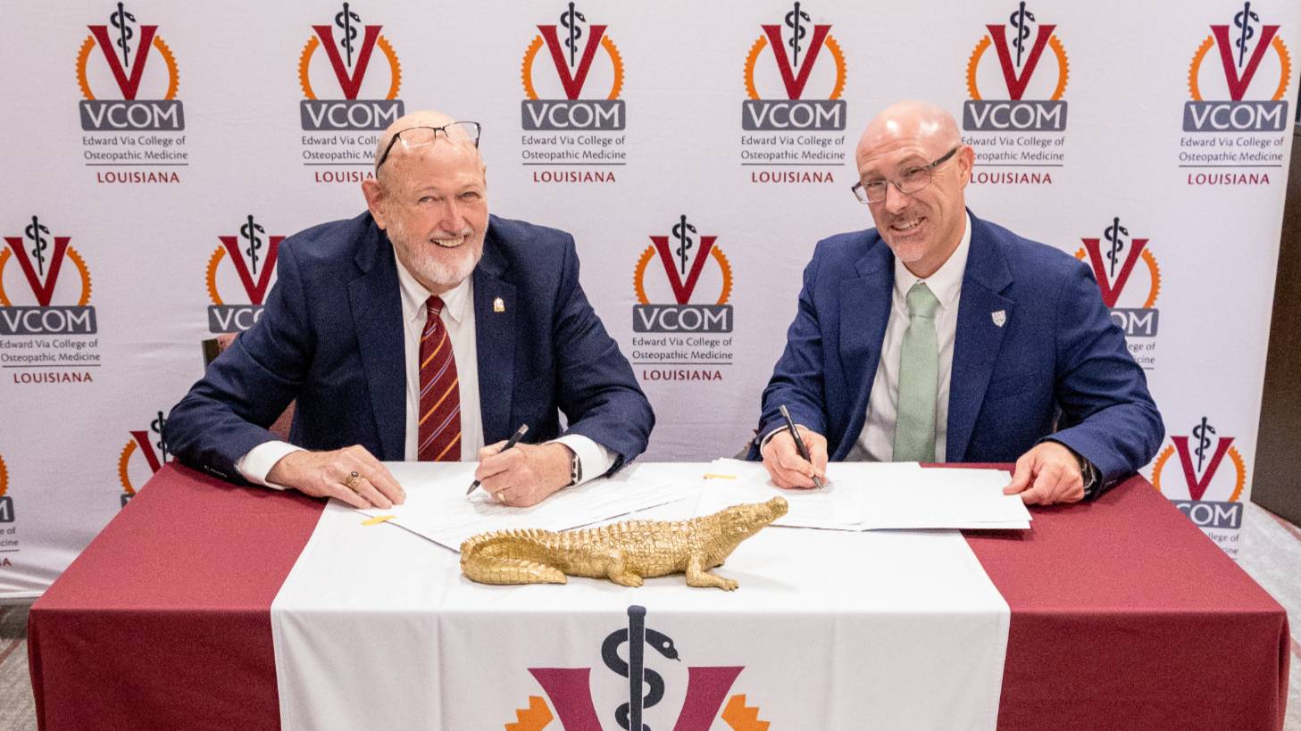 Dr. Bellar and VCOM official